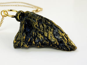 Gold Wyvern Scale Charm
